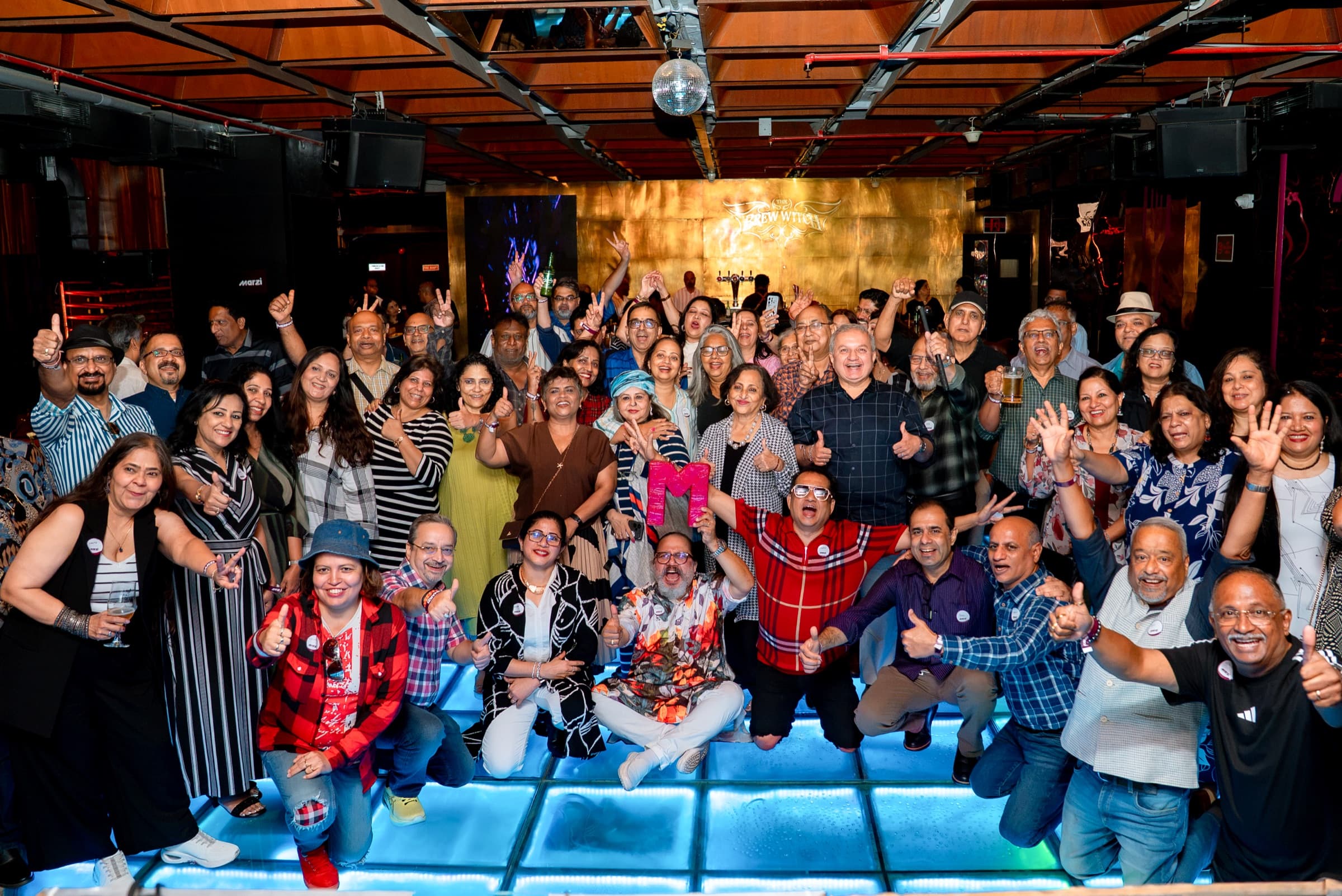 Marzi members celebrating together at a meetup